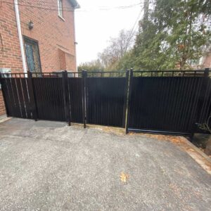 Corrugated-Aluminum-Privacy-Fence-Panels-Installed-in-Oakville-by-Toronto-Fence